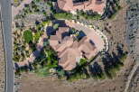 Experience luxury living in this stunning aerial view of a sprawling estate.