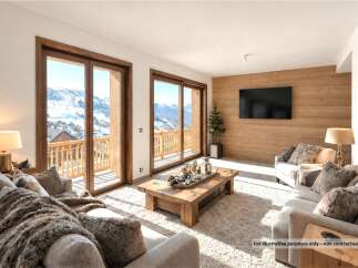 Experience breathtaking mountain views from this luxurious living room, featuring floor-to-ceiling windows that open onto a private balcony.