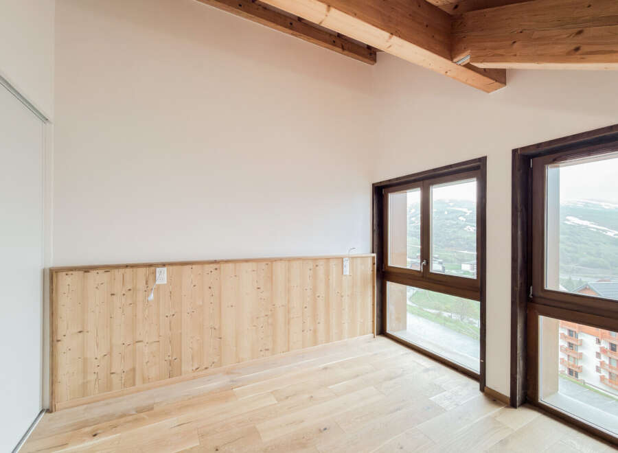 Experience breathtaking mountain views from this stunning property, featuring expansive windows that flood the space with natural light.