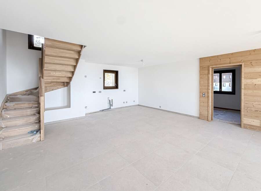 Discover this unfinished interior space, perfect for customization.
