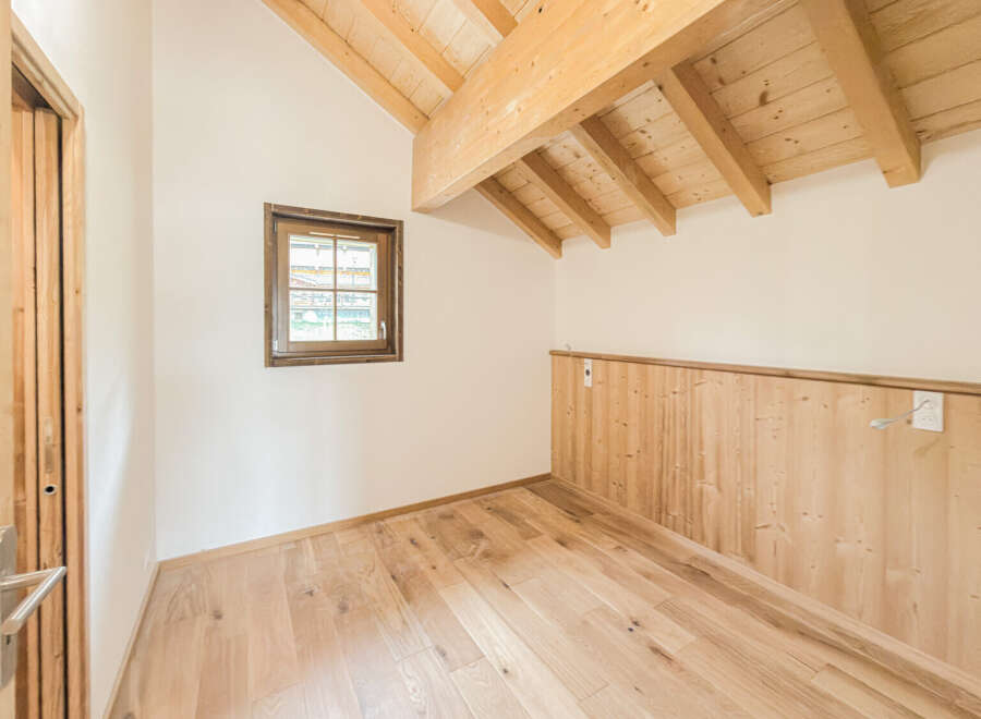 Experience rustic charm and modern comfort in this beautifully appointed room.