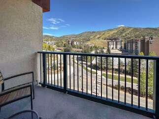 Enjoy breathtaking mountain views from this stunning balcony, perfect for your morning coffee or evening relaxation.