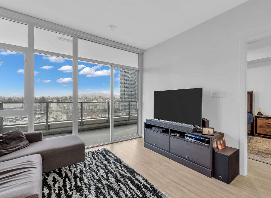 Experience breathtaking city and mountain views from this stunning condo's expansive balcony, perfect for enjoying your morning coffee or evening relaxation.