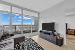 Experience breathtaking city and mountain views from this stunning condo's expansive balcony, perfect for enjoying your morning coffee or evening relaxation.