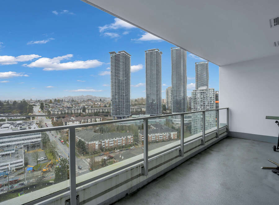 Experience breathtaking city and mountain views from this expansive balcony, perfect for entertaining or relaxing.