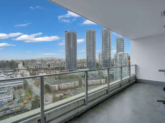 Experience breathtaking city and mountain views from this expansive balcony, perfect for entertaining or relaxing.
