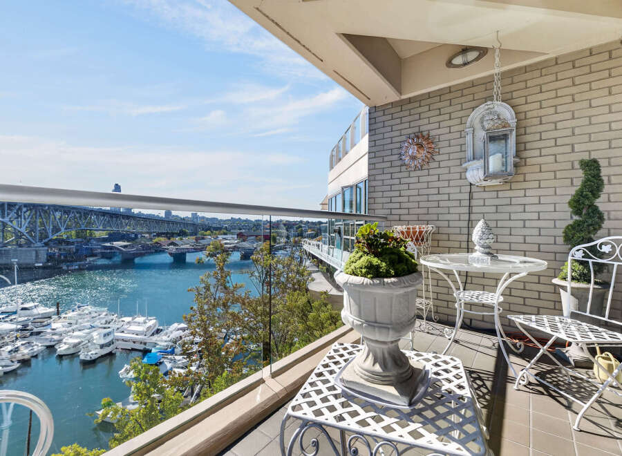 Enjoy breathtaking waterfront views from this stunning balcony, perfect for relaxing or entertaining.