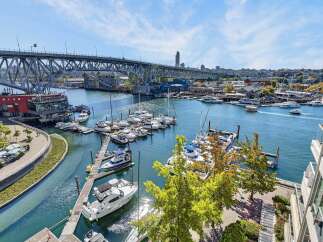 Experience waterfront living at its finest with this stunning property offering panoramic views of the marina and city skyline.