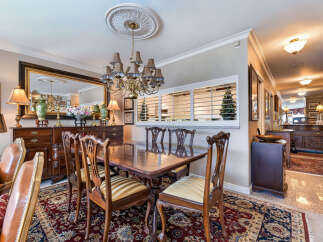 Step into this elegant dining room, perfect for hosting memorable gatherings.