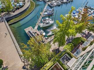 Experience waterfront living with this stunning property featuring a private marina and direct access to the water.