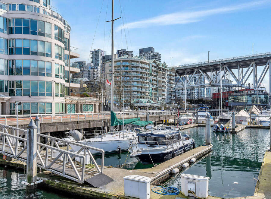 Experience waterfront living at its finest in this stunning property, featuring modern architecture and breathtaking marina views.