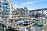 Experience waterfront living at its finest in this stunning property, featuring modern architecture and breathtaking marina views.