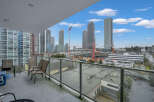 Experience breathtaking city and construction views from this spacious balcony, perfect for enjoying your morning coffee or evening relaxation.