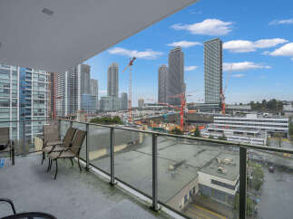 Experience breathtaking city and construction views from this spacious balcony, perfect for enjoying your morning coffee or evening relaxation.