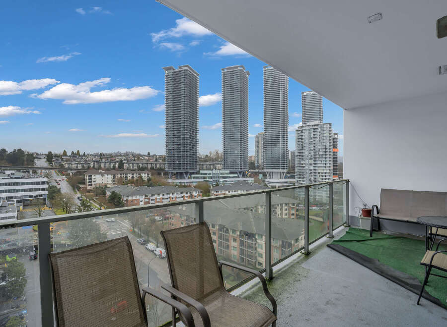 Enjoy breathtaking city and mountain views from this spacious balcony, perfect for relaxing or entertaining.