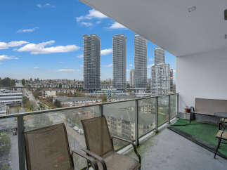 Enjoy breathtaking city and mountain views from this spacious balcony, perfect for relaxing or entertaining.