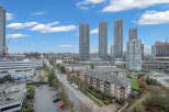 Experience modern urban living in this vibrant cityscape featuring sleek high-rise apartments and well-maintained residential buildings.