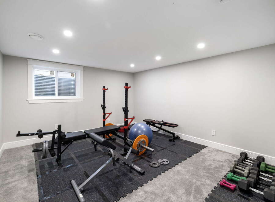 Transform your home into a personal fitness sanctuary with this dedicated gym space.