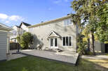 Enjoy outdoor living with this spacious backyard featuring a large paved patio perfect for entertaining.