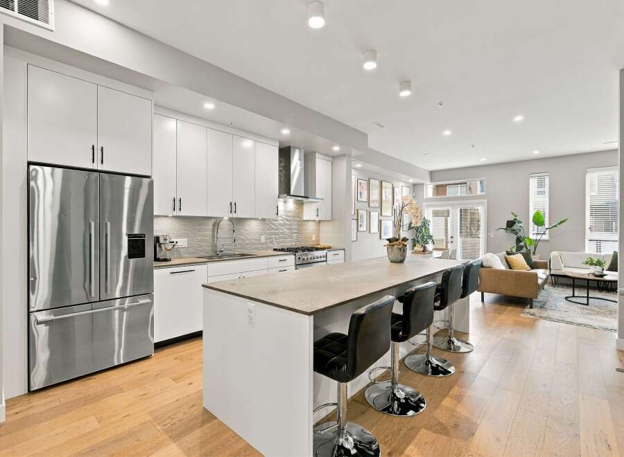 Experience modern living in this stunning open-concept kitchen and living area.