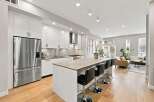 Experience modern living in this stunning open-concept kitchen and living area.