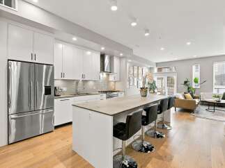 Experience modern living in this stunning open-concept kitchen and living area.