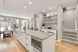 Experience modern living in this stunning open-concept kitchen and dining area.