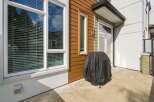 Enjoy outdoor living on this spacious patio, perfect for entertaining or relaxing.
