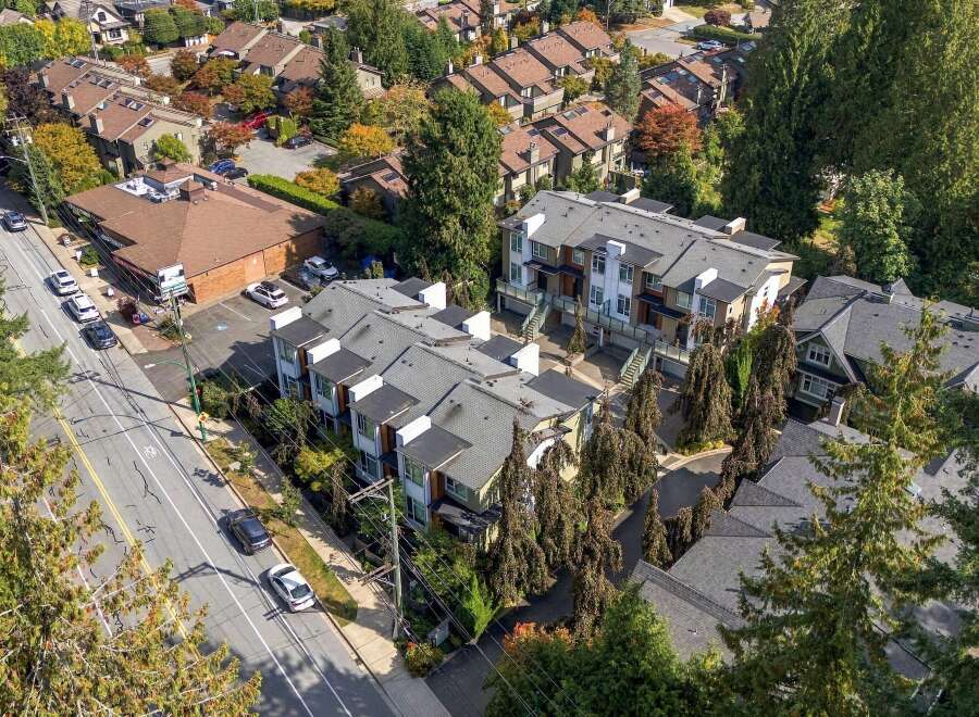 Discover modern living in this stunning townhouse complex, featuring contemporary architecture and multiple levels of living space.