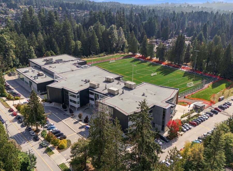 Discover this modern educational facility featuring a state-of-the-art artificial turf sports field, perfect for athletic programs and community events.