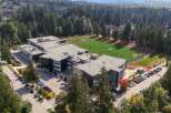 Discover this modern educational facility featuring a state-of-the-art artificial turf sports field, perfect for athletic programs and community events.