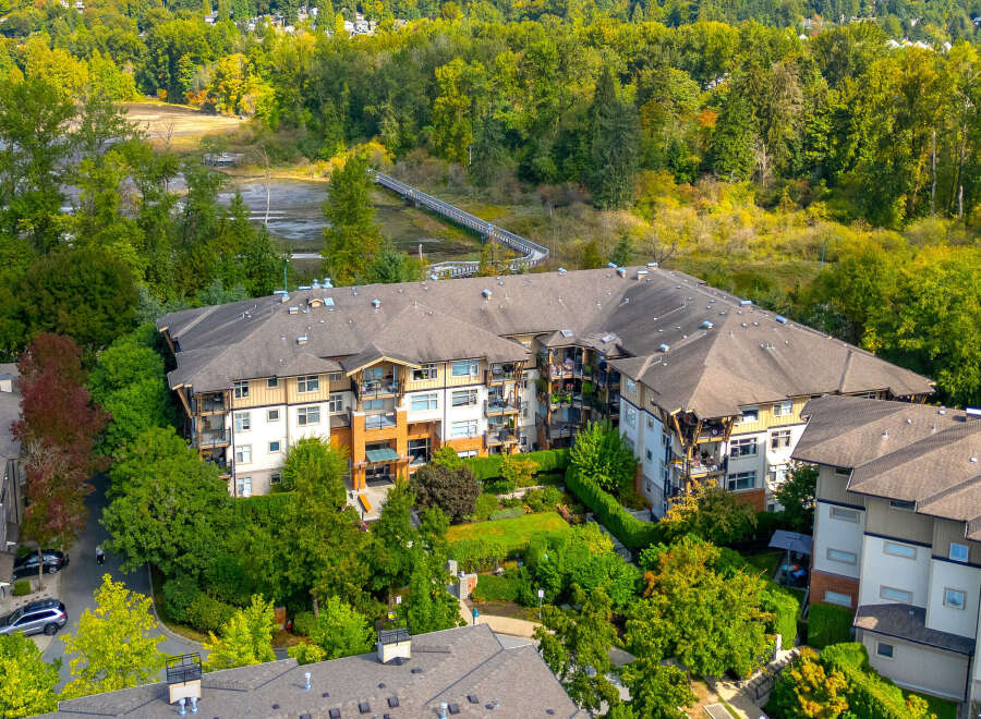 Discover modern living in this stunning apartment complex, nestled amidst lush greenery and mature trees.