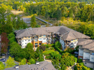 Discover modern living in this stunning apartment complex, nestled amidst lush greenery and mature trees.