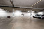 Discover convenient parking solutions in this well-maintained garage, featuring designated spots for small cars and a handicap-accessible space.
