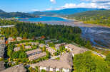 Discover this stunning waterfront community offering modern townhomes with beautiful fall foliage views.