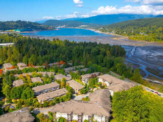 Discover this stunning waterfront community offering modern townhomes with beautiful fall foliage views.