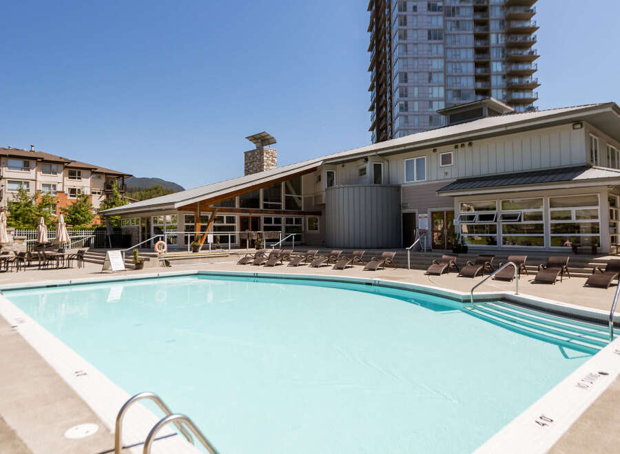 Enjoy resort-style living with this stunning outdoor swimming pool, perfect for relaxation and recreation.
