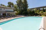 Enjoy a refreshing dip in this stunning outdoor swimming pool, perfect for sunny days.