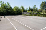 Enjoy outdoor recreation on this pristine tennis court, perfect for residents seeking an active lifestyle.