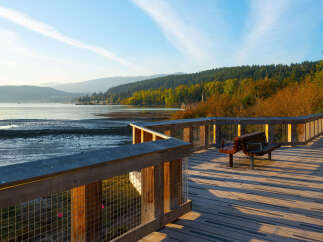 Enjoy serene waterfront living with this stunning property featuring a beautifully constructed boardwalk offering direct access to the water.