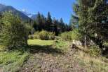 Discover this stunning property nestled amidst the majestic Alps, offering breathtaking mountain views and a serene natural setting.