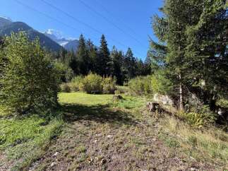 Discover this stunning property nestled amidst the majestic Alps, offering breathtaking mountain views and a serene natural setting.