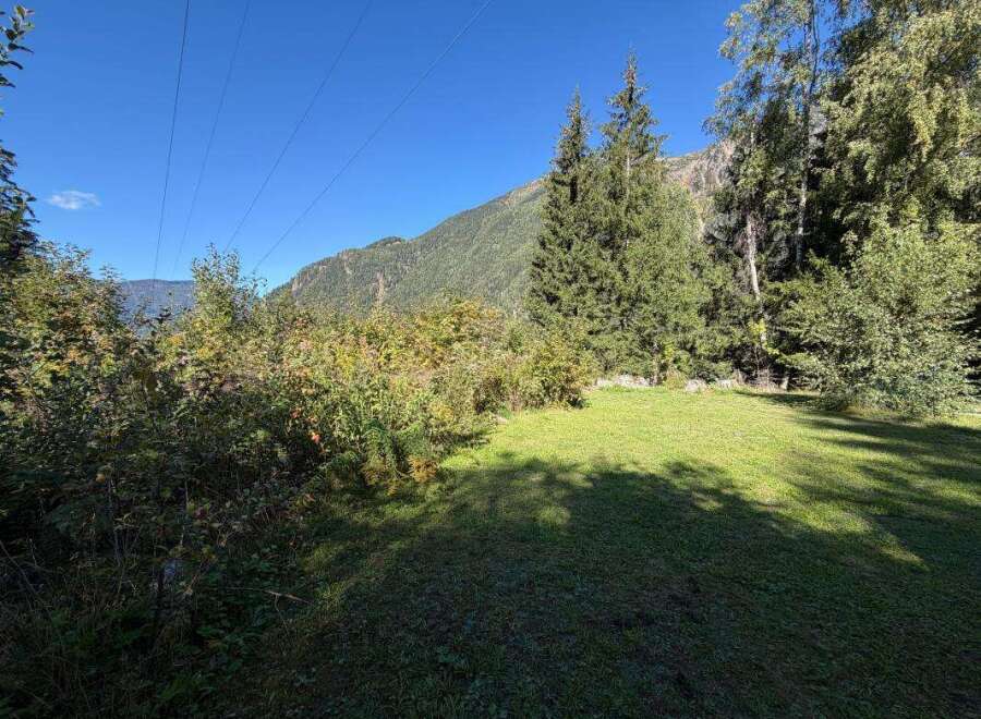 Discover this stunning property nestled amidst breathtaking mountain scenery.