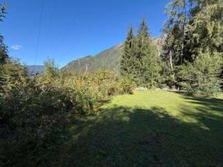 Discover this stunning property nestled amidst breathtaking mountain scenery.