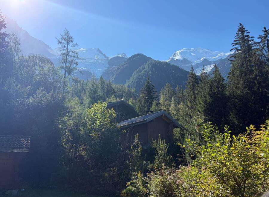 Experience the tranquility of mountain living with this charming property nestled amidst lush greenery and breathtaking alpine views.
