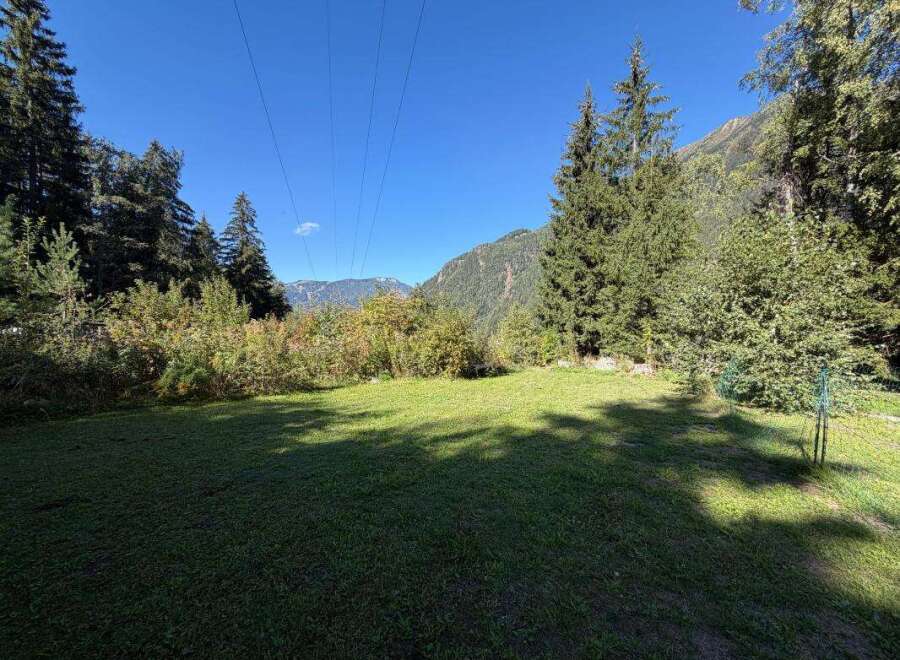 Discover this stunning property nestled amidst breathtaking mountain scenery.