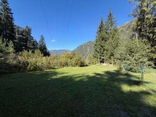 Discover this stunning property nestled amidst breathtaking mountain scenery.