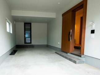 Discover modern living in this spacious garage with an attached entrance.