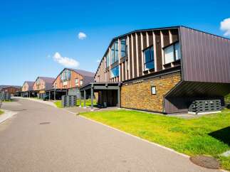 Discover modern living in this row of contemporary homes featuring unique architectural designs.