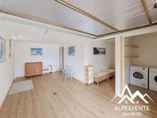 Discover this versatile space, perfect for a guest room or additional living area, featuring two comfortable twin beds and ample storage.